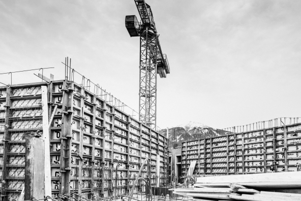 Construction site with cranes for residential building